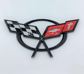 REIXS emblem installed on Corvette C5 deck lid demonstrating easy adhesive application benefit