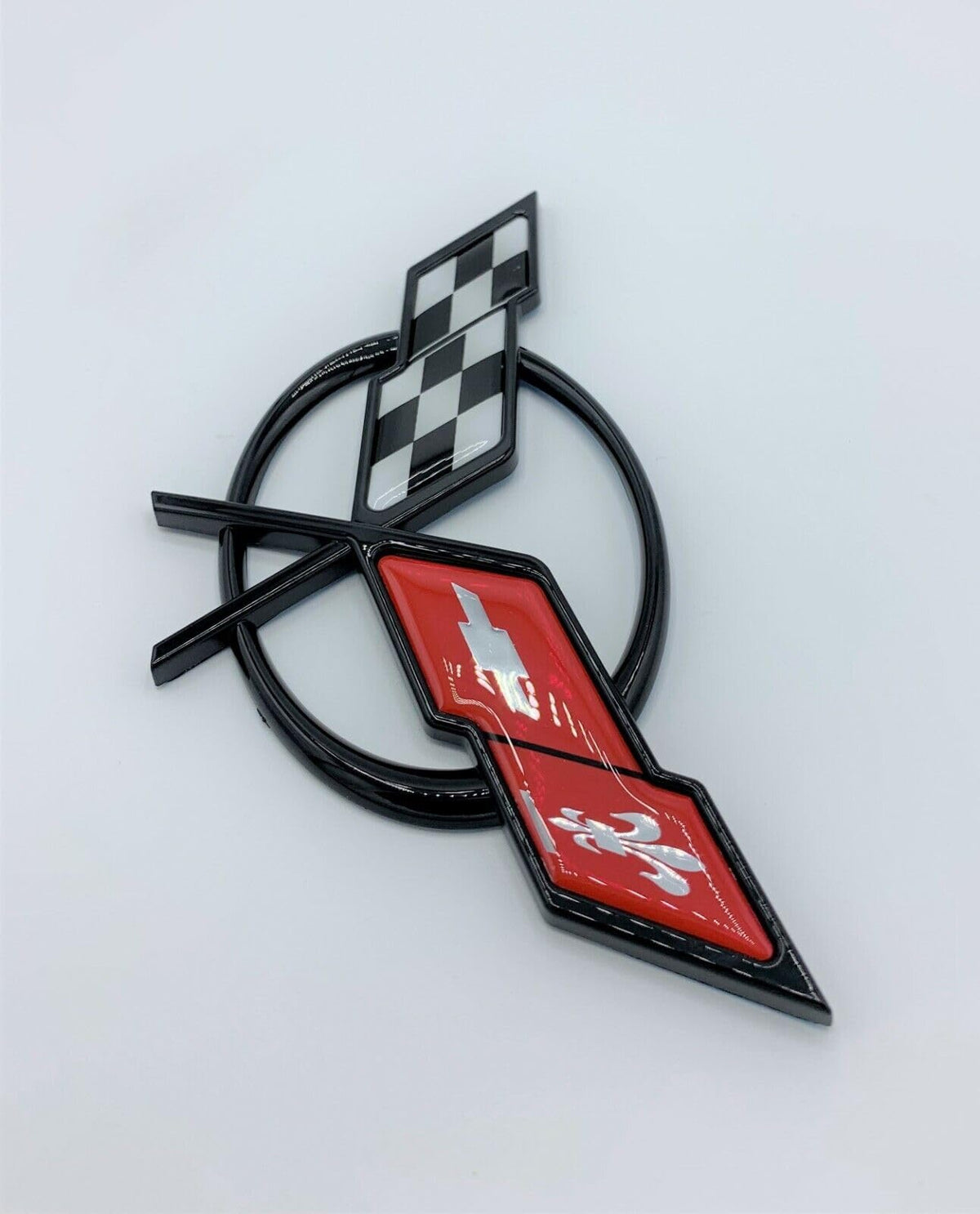 REIXS emblem beside ruler to show exact size for correct C5 fit and accurate replacement