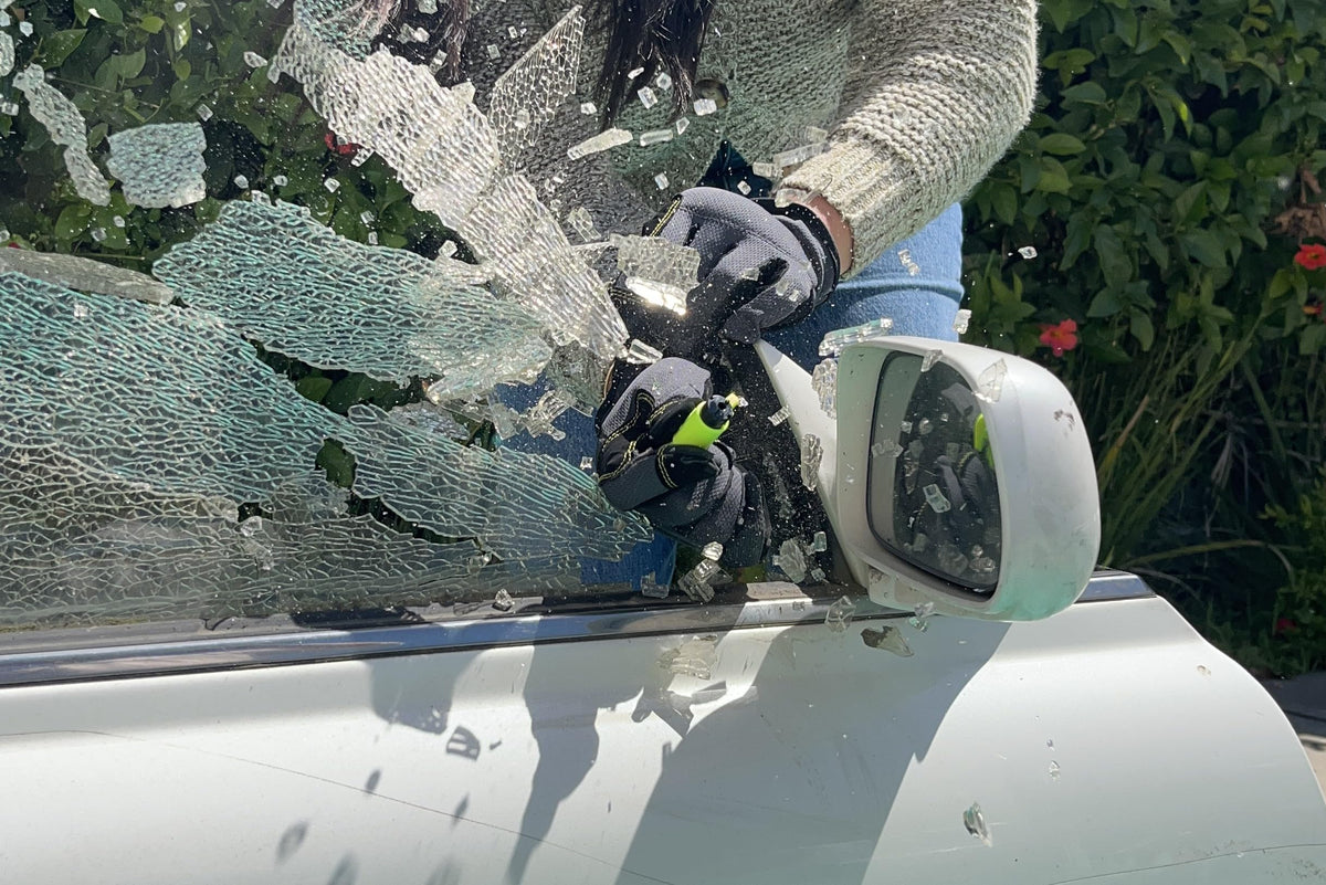 RESQME clipped to car sun visor for easy reach and peace of mind