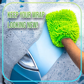 Rev Auto foam cannon spraying thick foam onto a wrapped car for even coverage