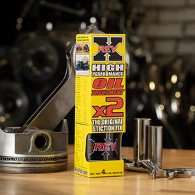 REV X in a garage setting used by a mechanic showing maintenance convenience