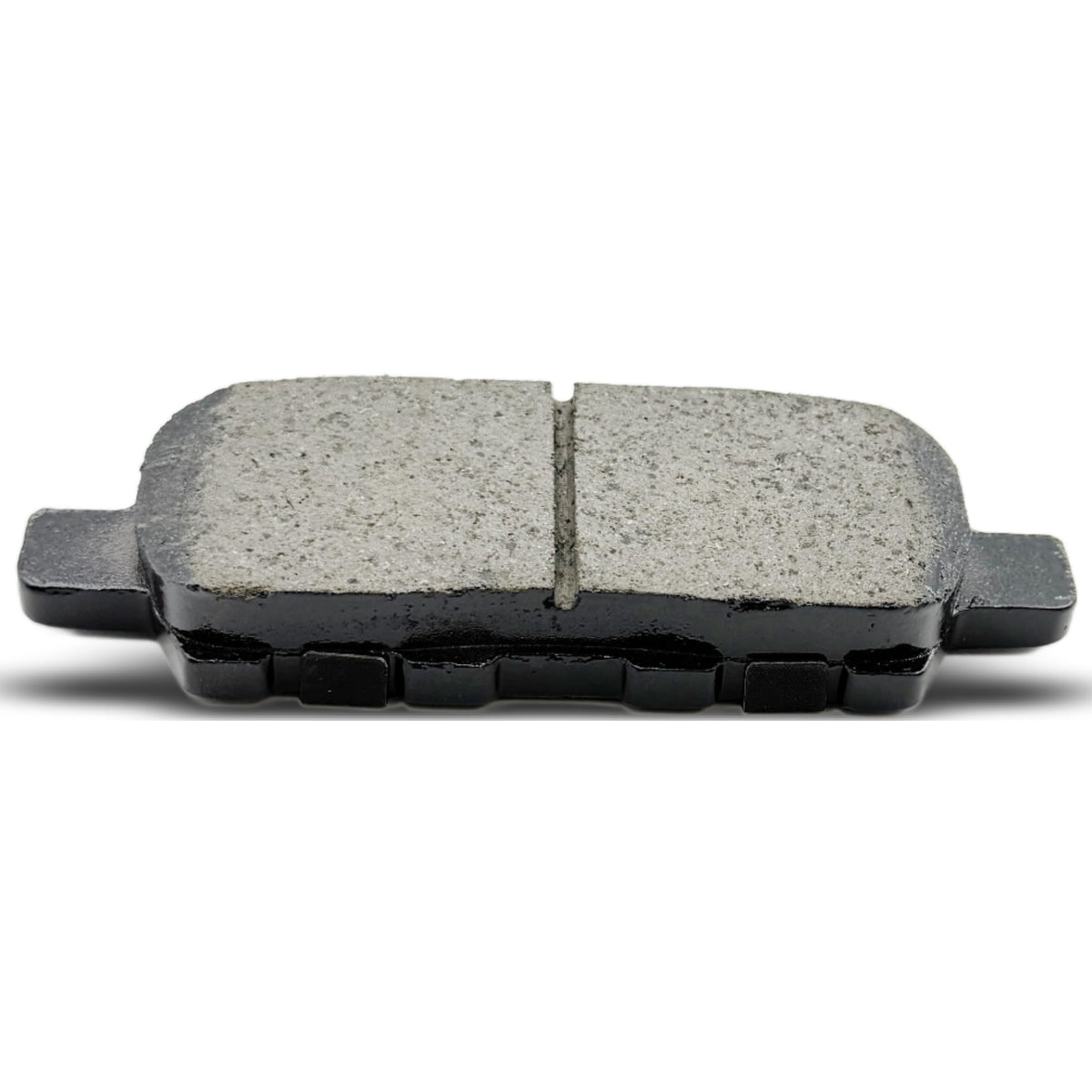 RevivaParts brake pads on Nissan with clean wheels showing reduced dust benefit