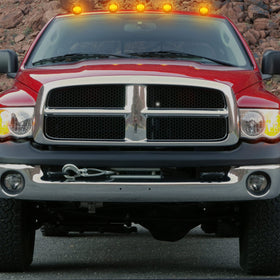 R&F Auto cab light next to ruler for scale to show compact, OEM fit