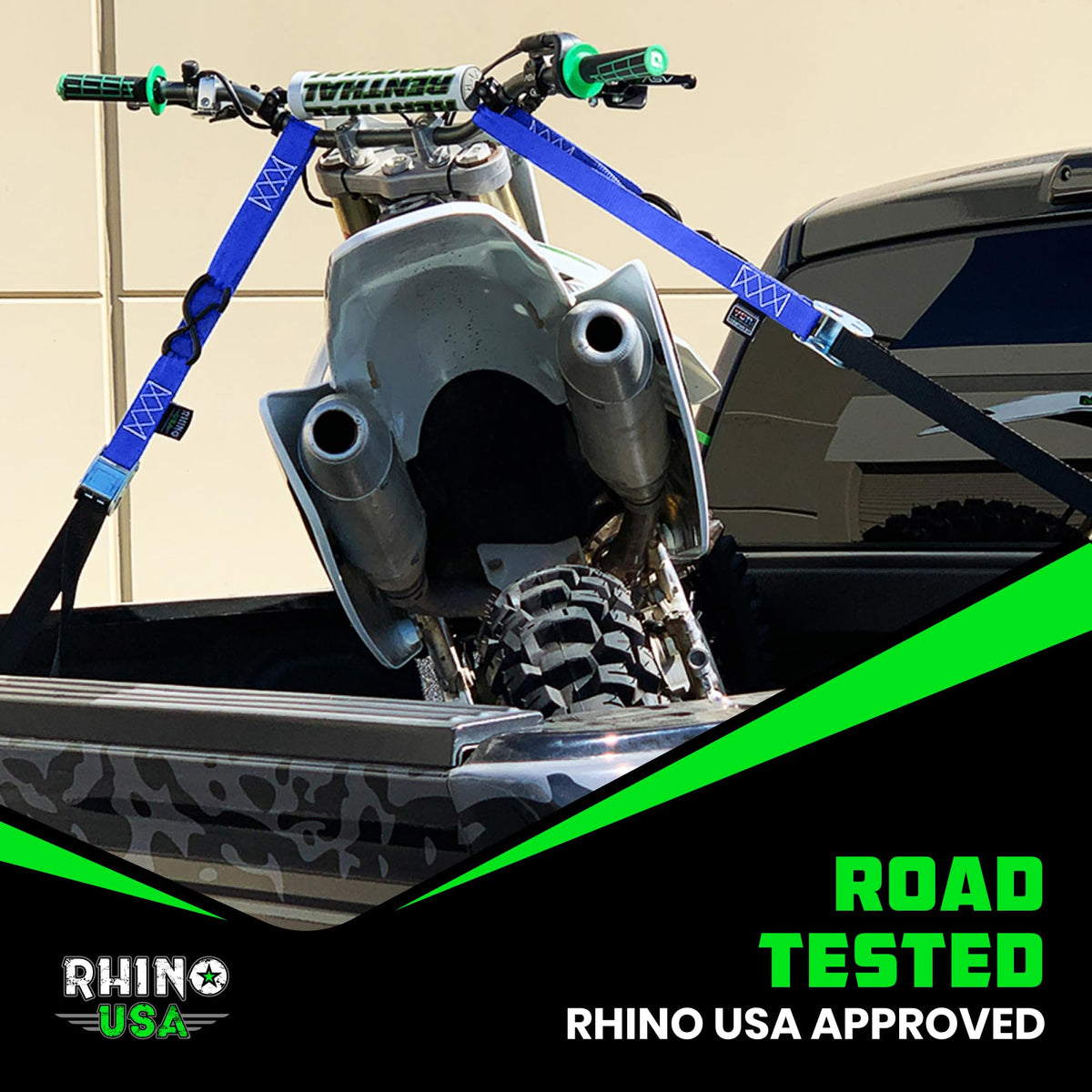 Rhino USA owner loading motorcycle into truck showing easy setup and reliability benefit