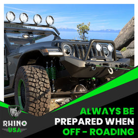 Rhino USA shackles in off-road recovery scene showing dependable strength
