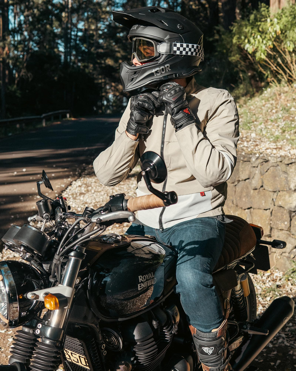 RIDEIRON lifestyle rider on bike showing jacket performance and style in action