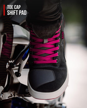 RIDEIRON boot beside a ruler to show size and scale comparison