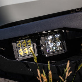 RIGID INDUSTRIES pod next to hand showing compact size and easy-fit benefit