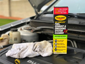 Rislone with exhaust sensor graphic illustrating emissions cleaning advantage