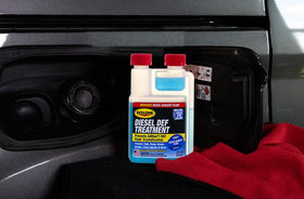 Rislone added at vehicle DEF fill cap protecting SCR components