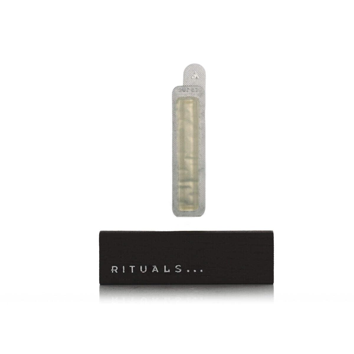 RITUALS clip attached to car vent demonstrating easy installation and airflow control