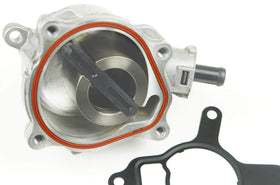 RKX kit parts placed beside vacuum pump to show compatibility and clear identification