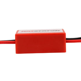 RMSTATOR adapter with multimeter probes attached demonstrating quick plug-and-play use