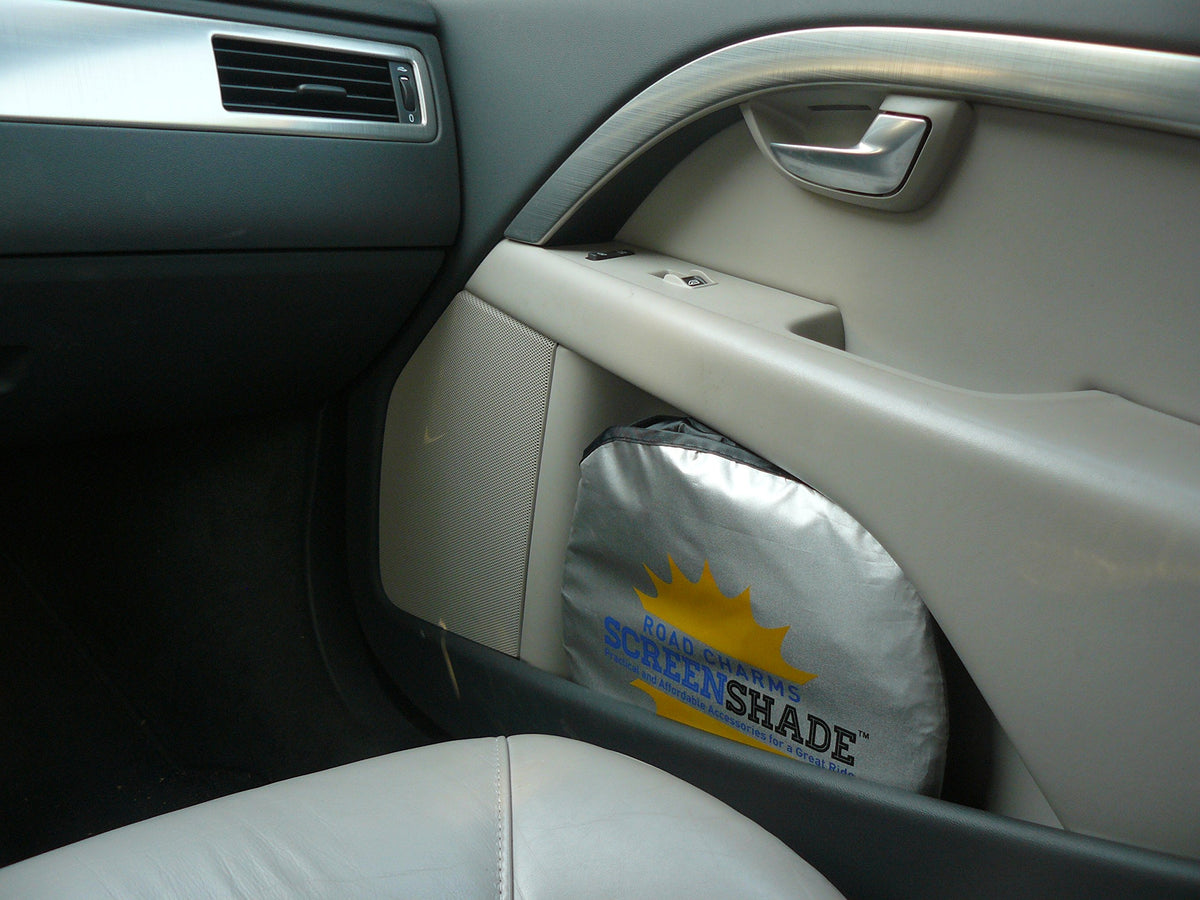 Road Charms lifestyle shot in van parking scene showing quick deployment and sun protection