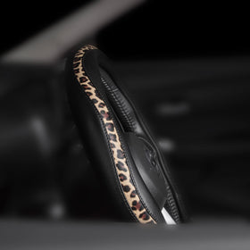 Road Comforts PVC leather texture close-up demonstrating easy-clean durability
