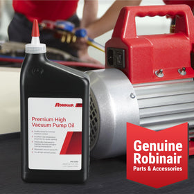 Robinair 13203 being poured into a pump with scale showing quantity control