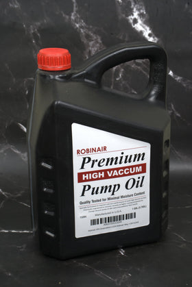 Robinair bottle being poured into a vacuum pump illustrating maintenance efficiency benefit