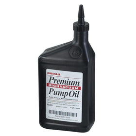 Robinair bottle beside vacuum pump demonstrating compatibility and reliable performance
