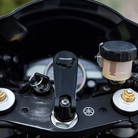 Rokform mount with phone attached showing secure retention benefit