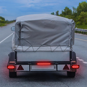 RONSTA lights installed on a utility trailer demonstrating road-ready, professional fit