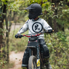 Roozo helmet worn by child on trail demonstrating comfortable fit and clear vision