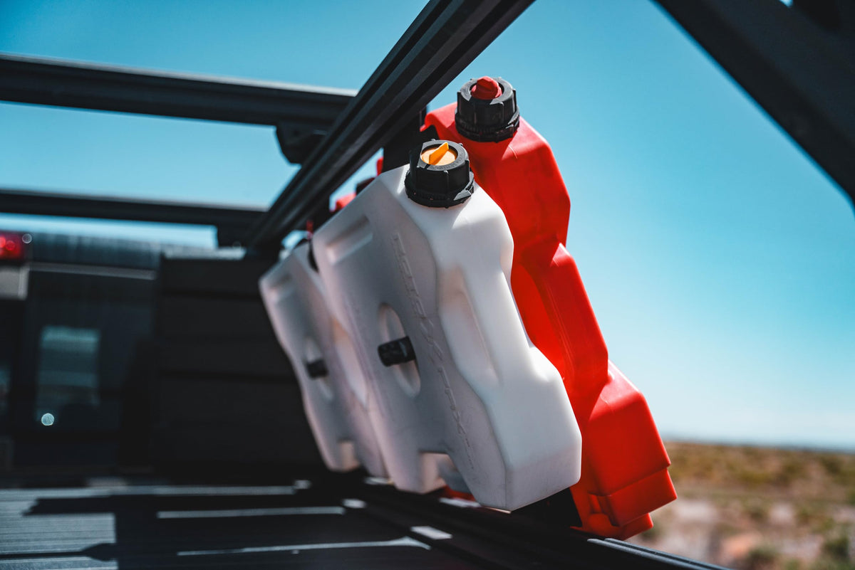 RotopaX beside a hiker to show 2 gallon scale and easy portability