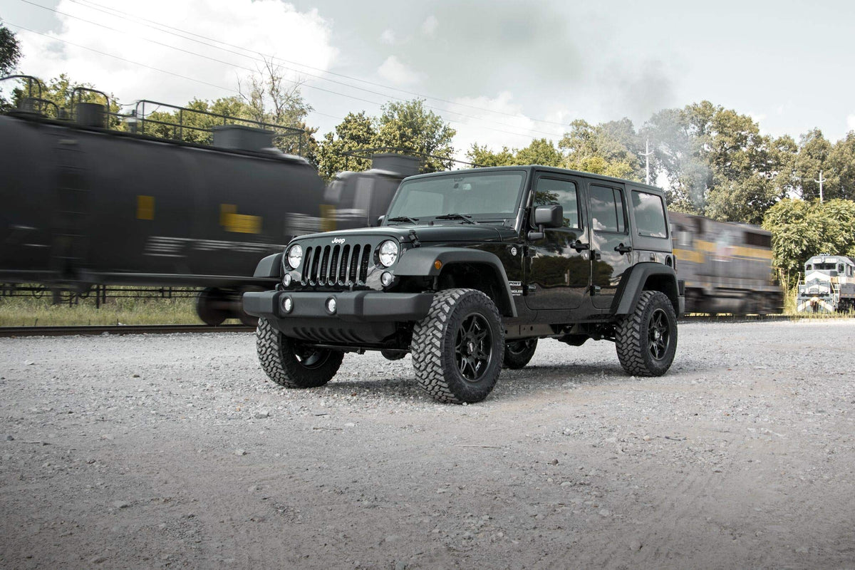 Rough Country Jeep JK Unlimited side profile showing new stance and height