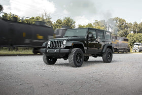 Rough Country Jeep JK Unlimited side profile showing new stance and height