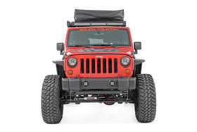 Rough Country caps installed on a Jeep Wrangler JK demonstrating better approach angles