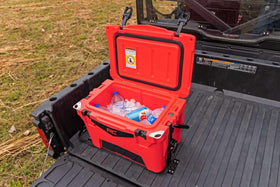 Rough Country lifestyle shot of UTV on trail with secured cooler for peace of mind