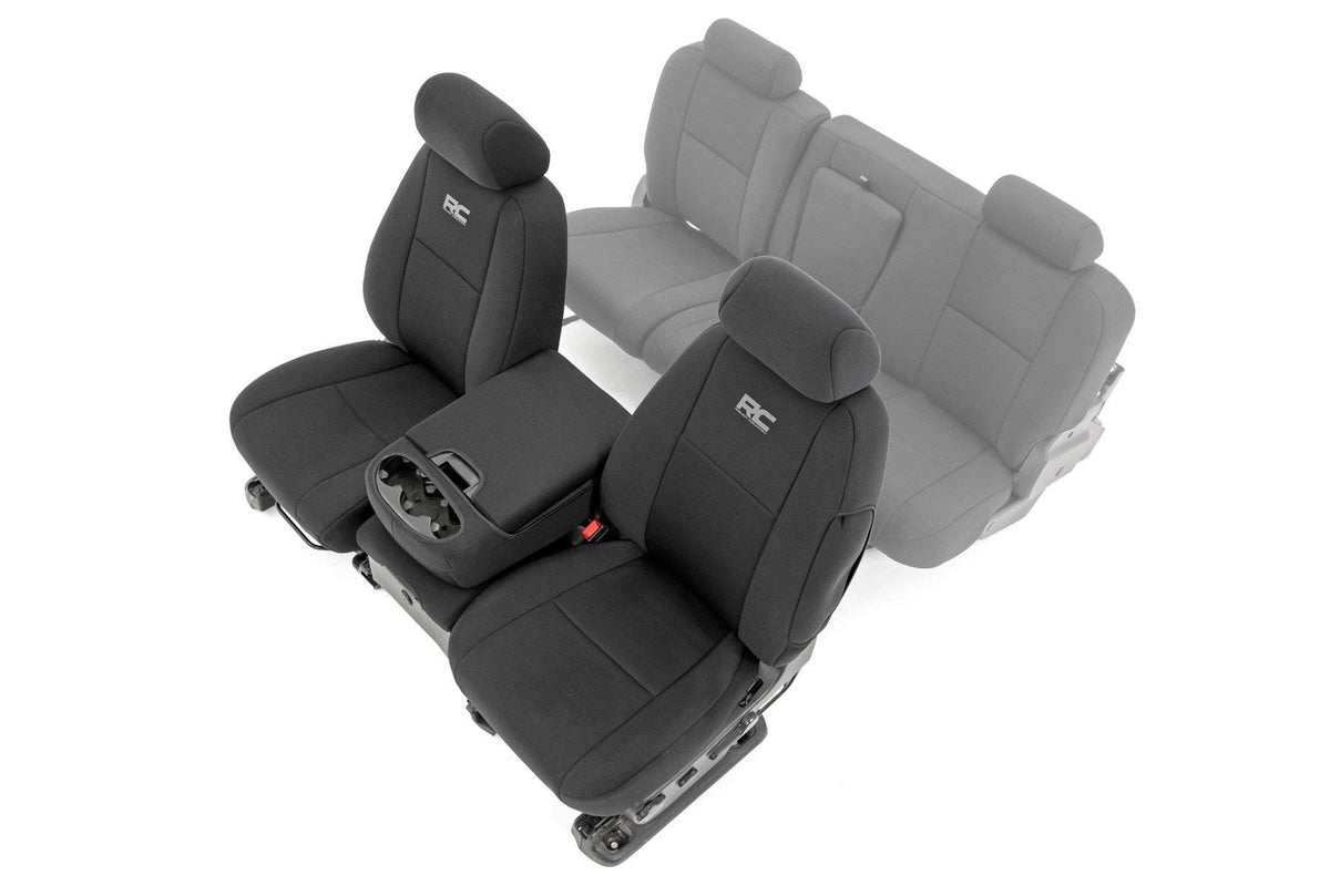 Rough Country front seat covers installed on Silverado showing snug factory fit and protection