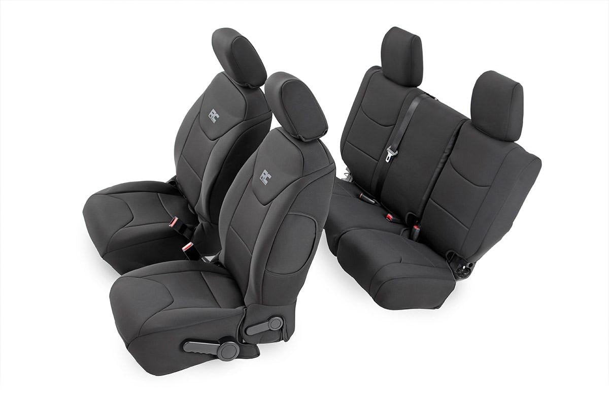 Rough Country front seat covers on Jeep showing protective coverage and neat fit