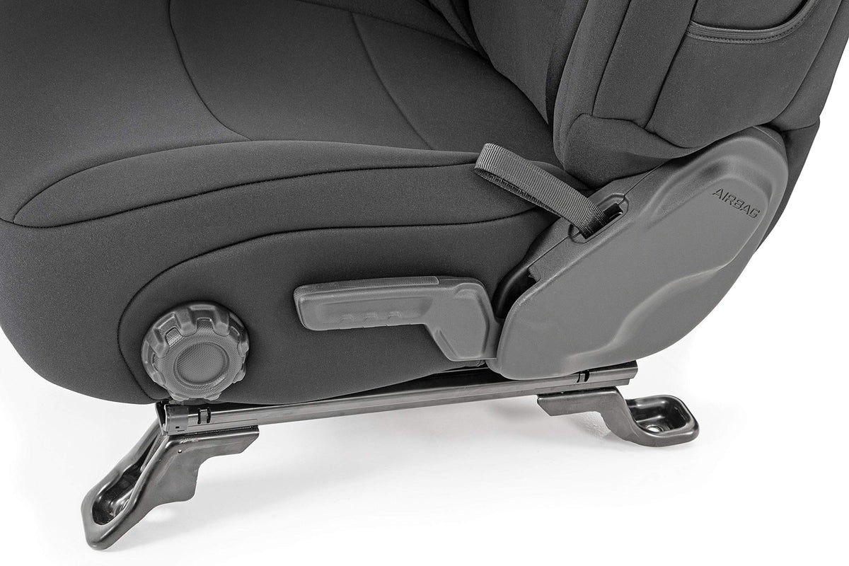 Rough Country covers beside measuring tape showing precise fit for model-specific seats