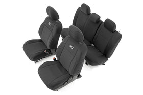 Rough Country front seat covers on Tacoma showing snug, protective fit