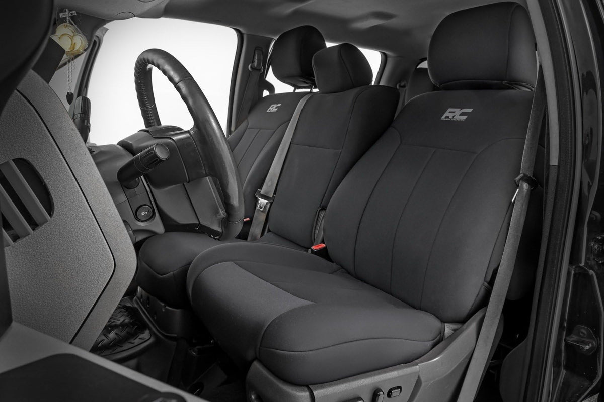 Rough Country front seats full view showing snug factory-fit protection and clean look