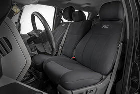 Rough Country front seats full view showing snug factory-fit protection and clean look