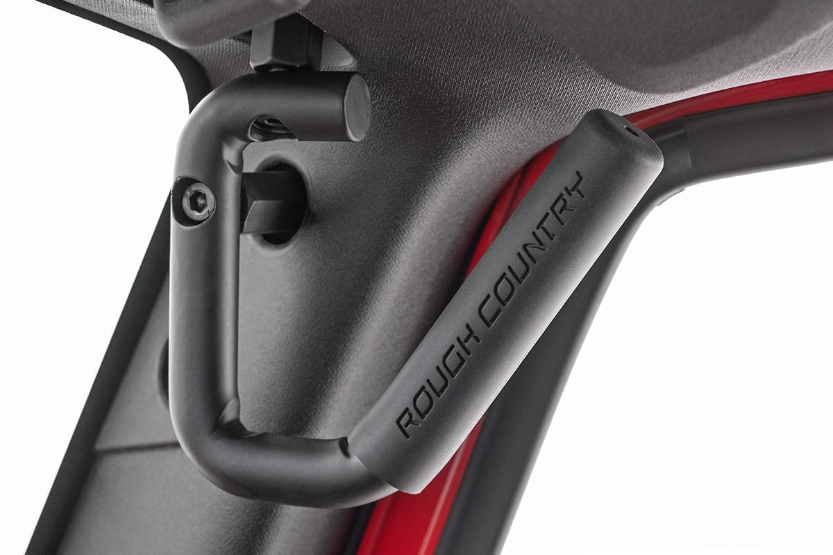 Rough Country handle mounted on Jeep Wrangler front showing secure support benefit
