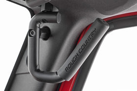 Rough Country handle mounted on Jeep Wrangler front showing secure support benefit