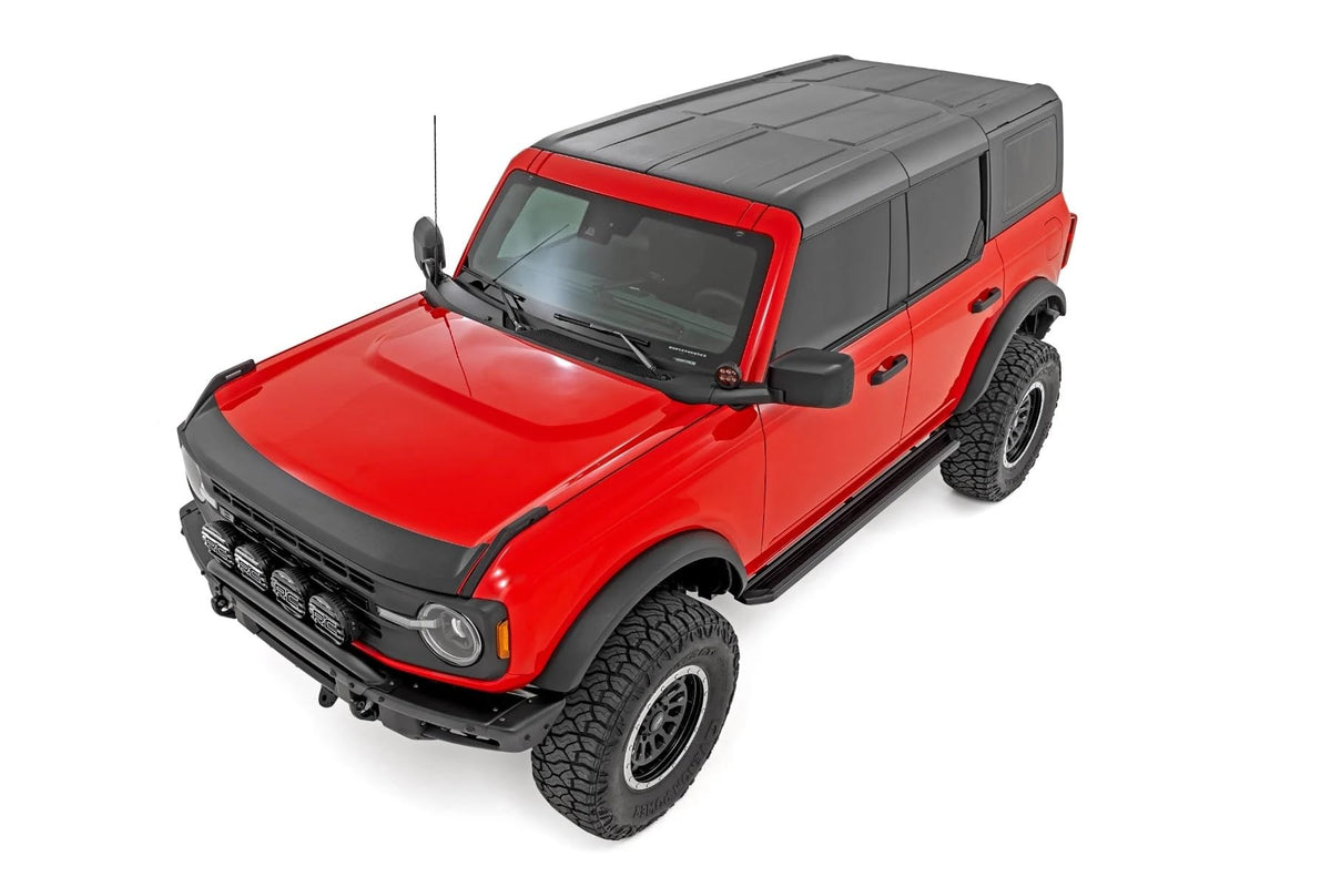 Rough Country hood protector on Bronco off-road demonstrating real-world protection