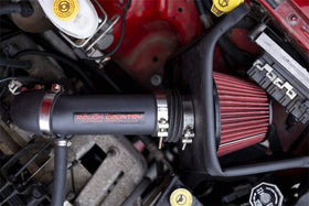 Rough Country intake on towing Silverado in landscape illustrating improved towing power and reliability