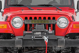Rough Country mounted winch with D-ring kit showing recovery readiness