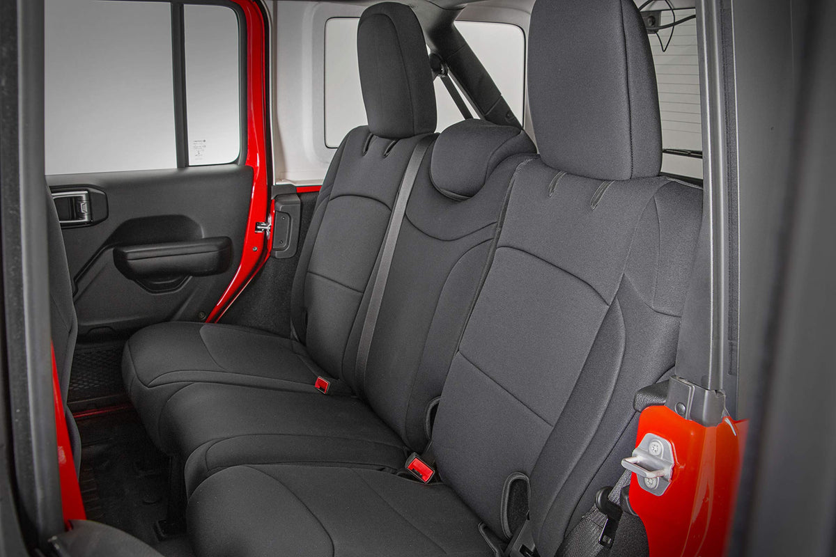 Rough Country rear seat covers installed showing full cabin protection benefit