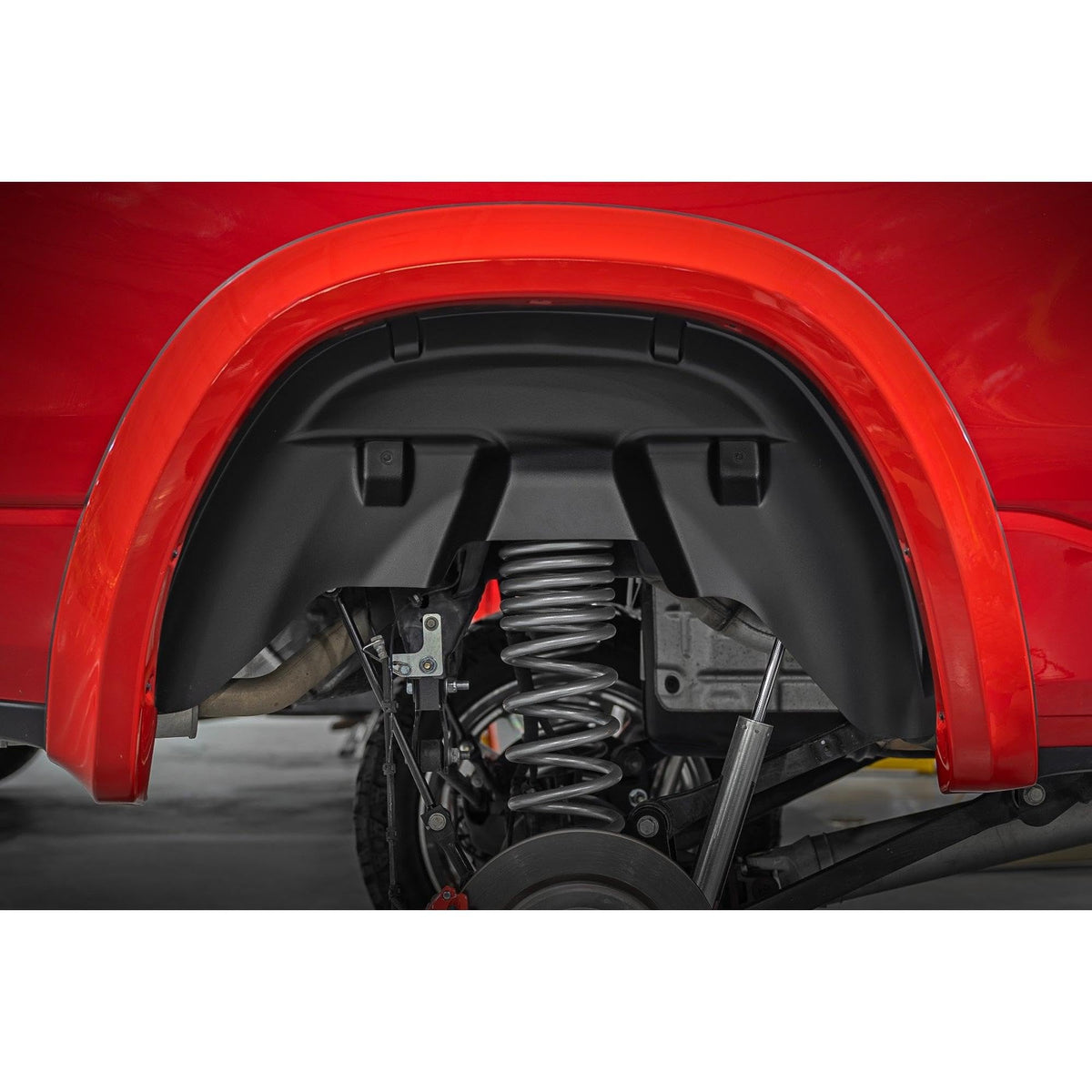 Rough Country front view of both rear wheel well liners showing fit and protection