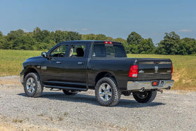 Rough Country liners repelling mud and debris to illustrate easier cleanup and protection