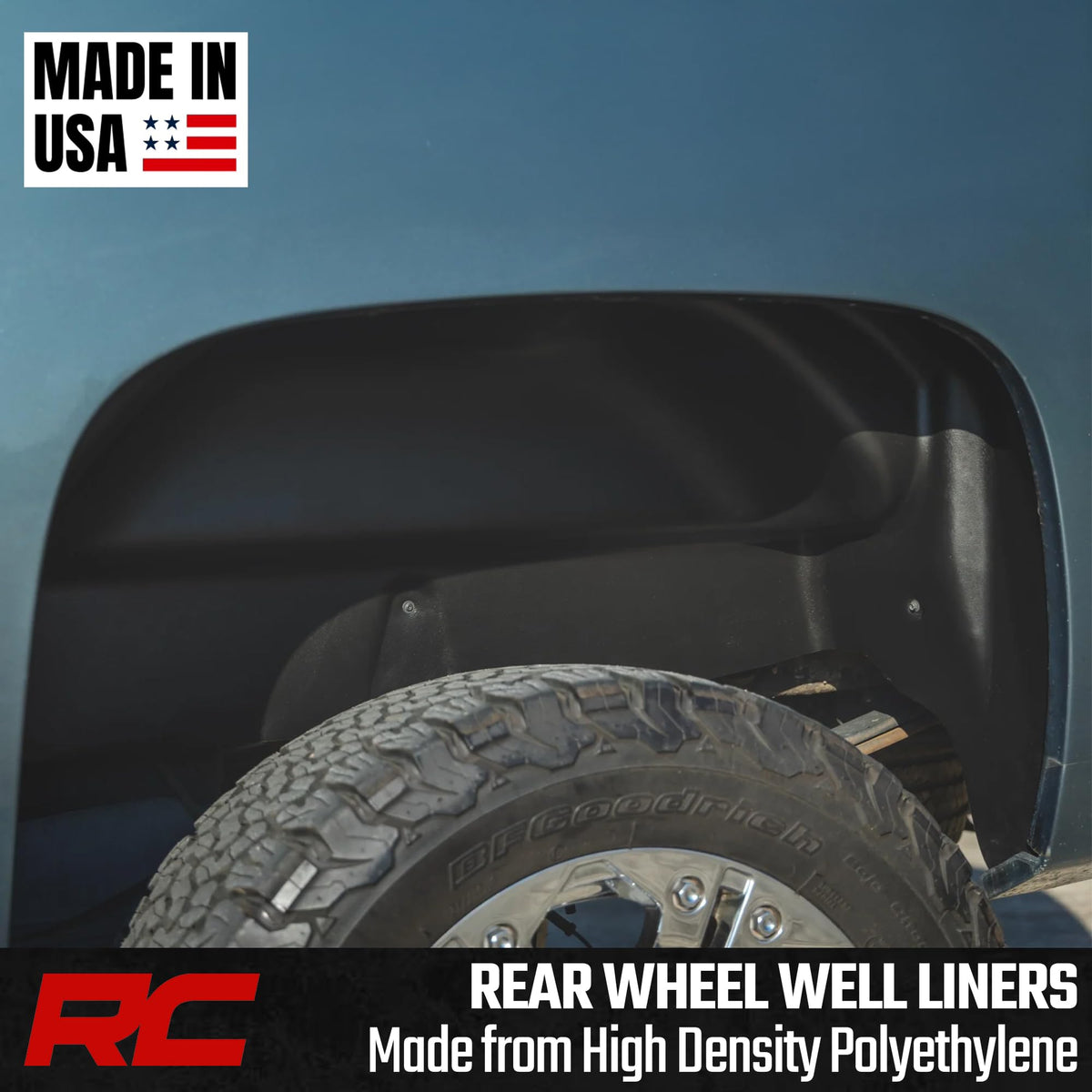Rough Country rear liners on truck splashing mud showcasing debris protection benefit