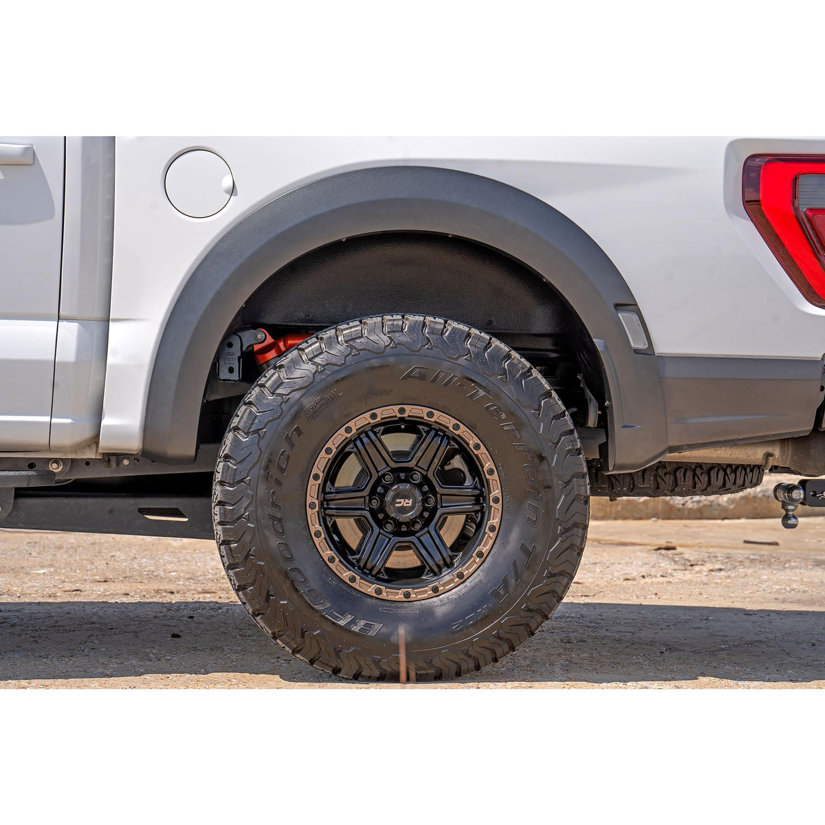 Rough Country liners with tools during installation showing quick bolt-on fit