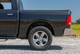 Rough Country installed side view on Ram showing finished look and gap coverage benefit