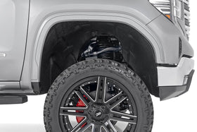 Rough Country delete next to tire showing added clearance and scale