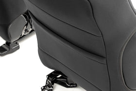 Rough Country seat in use with pet demonstrating water resistance and easy clean