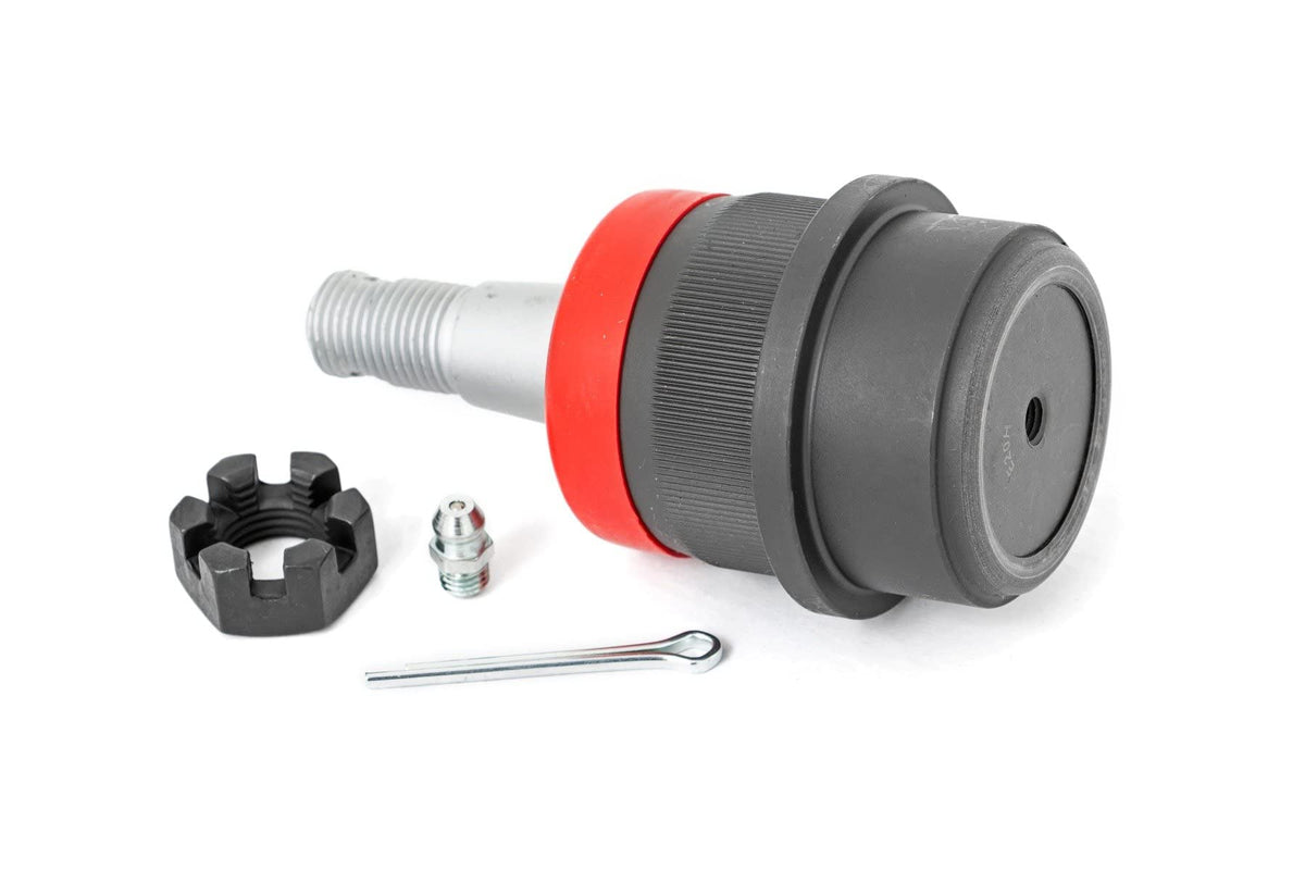 Rough Country ball joint next to ruler for scale showing correct sizing benefit